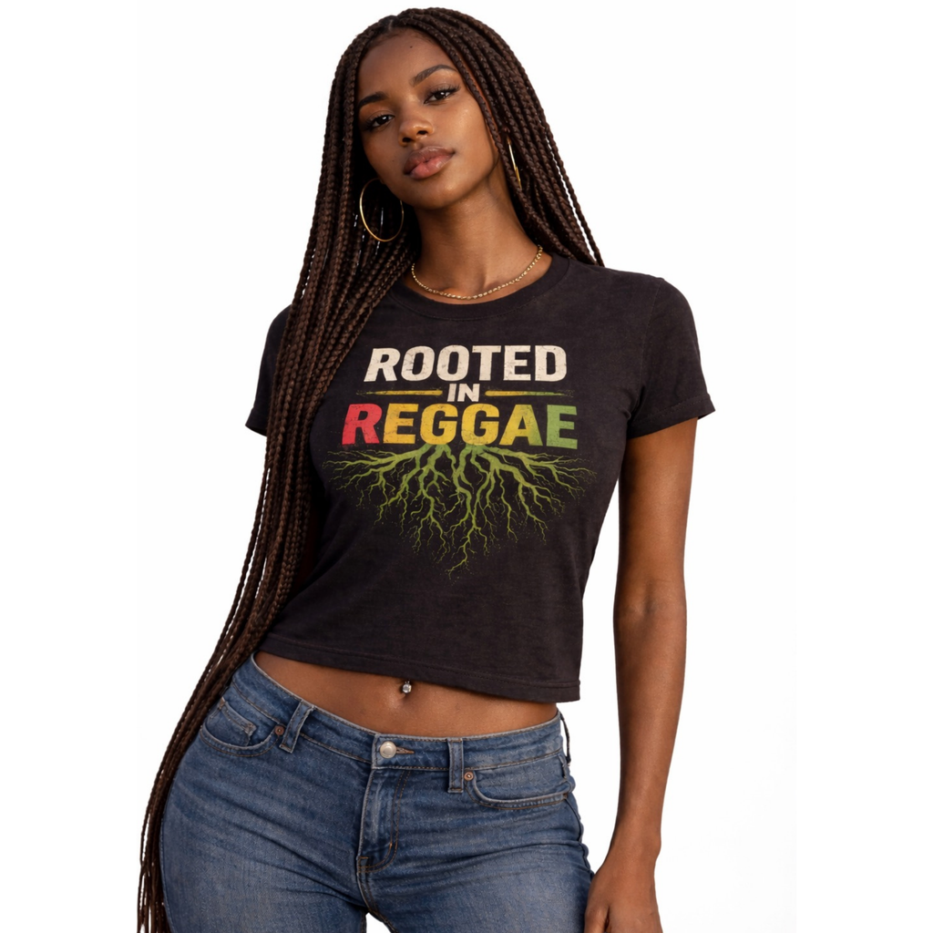 Woman wearing a black t-shirt with 'Rooted in Reggae' text and graphics with blue jeans on a white background