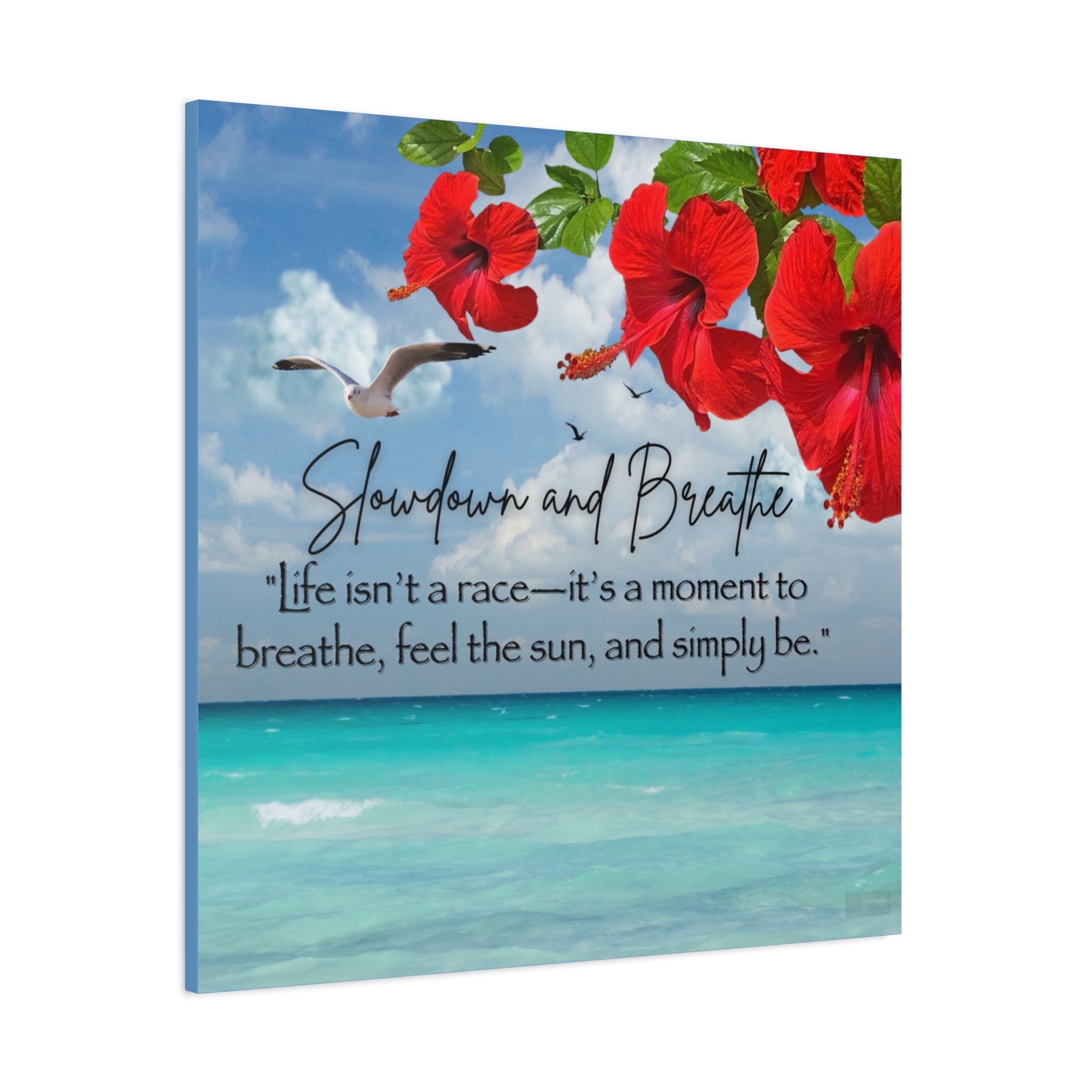 Tropical Canvas wall art with red flowers, a seagull, and a beach scene with a motivational quote - Side View. 