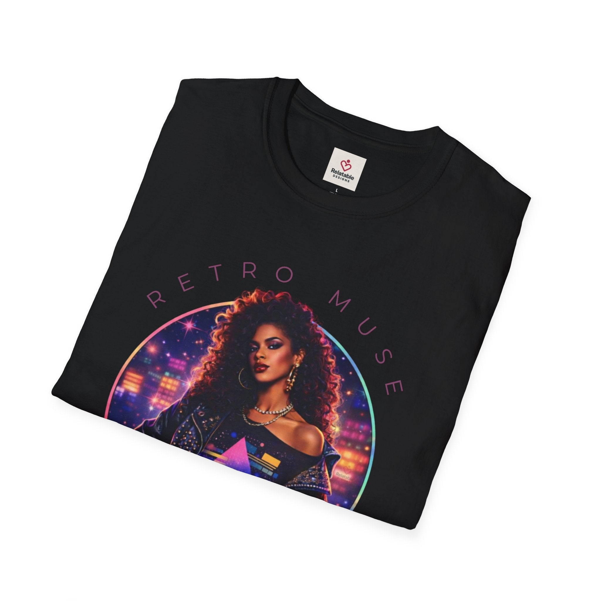 Folded Relatable Designs black graphic t-shirt featuring 80 theme and text 'Retro Muse' design printed on fabric