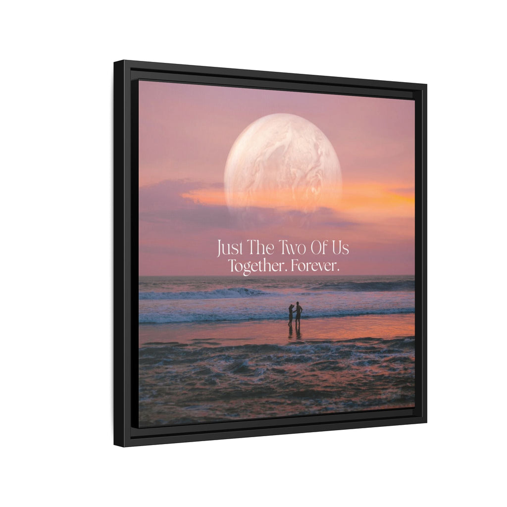 Framed artwork of a couple on a beach with a large moon and the text 'Just The Two Of Us Together, Forever.'