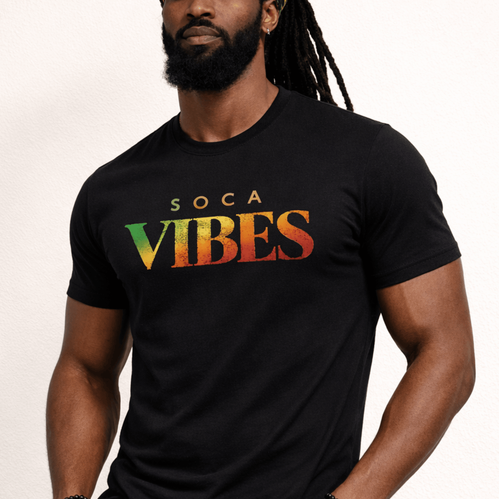 Man wearing a black t-shirt with 'Soca Vibes' text in Rasta colors on a plain background by Relatable Designs.