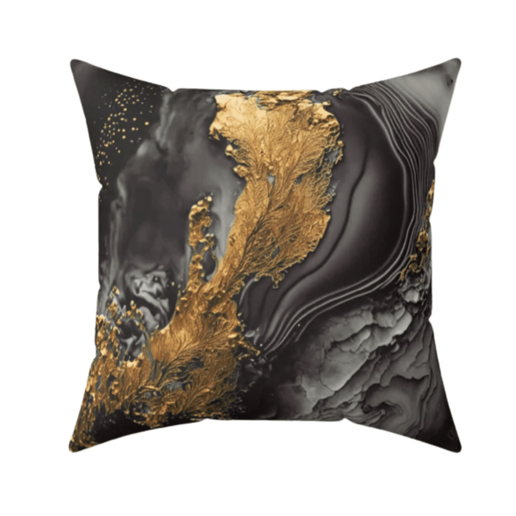 Decorative pillow with gold, black, and gray abstract design on a white background by Relatable Designs.