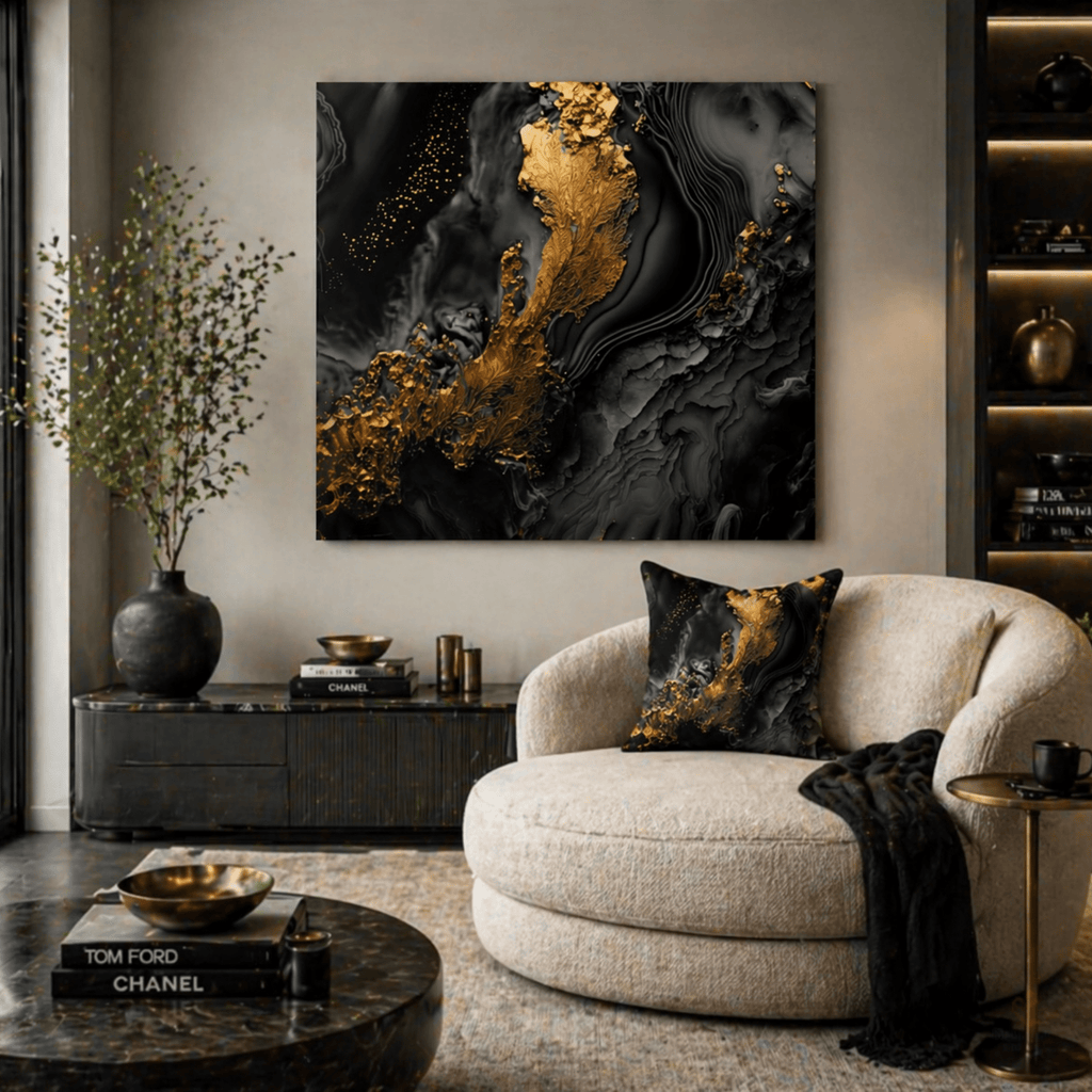 Modern living room with a beige armchair, abstract art, and decor items - Strong Luxury