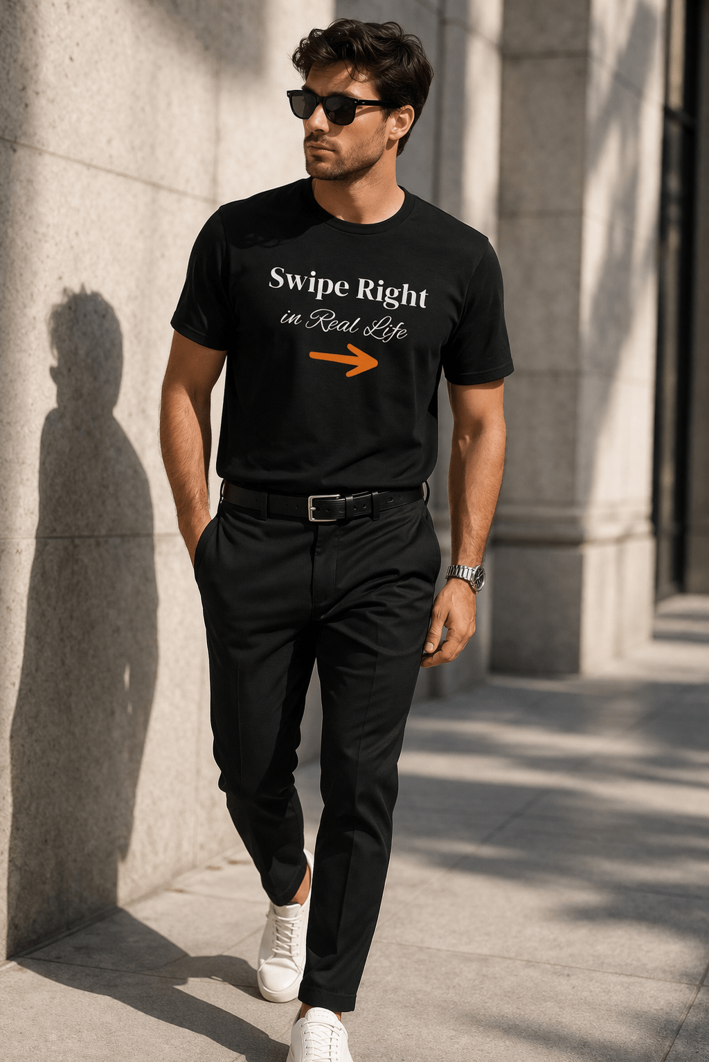 Man wearing a black t-shirt with 'Swipe Right in Real Life' text, walking outdoors.
