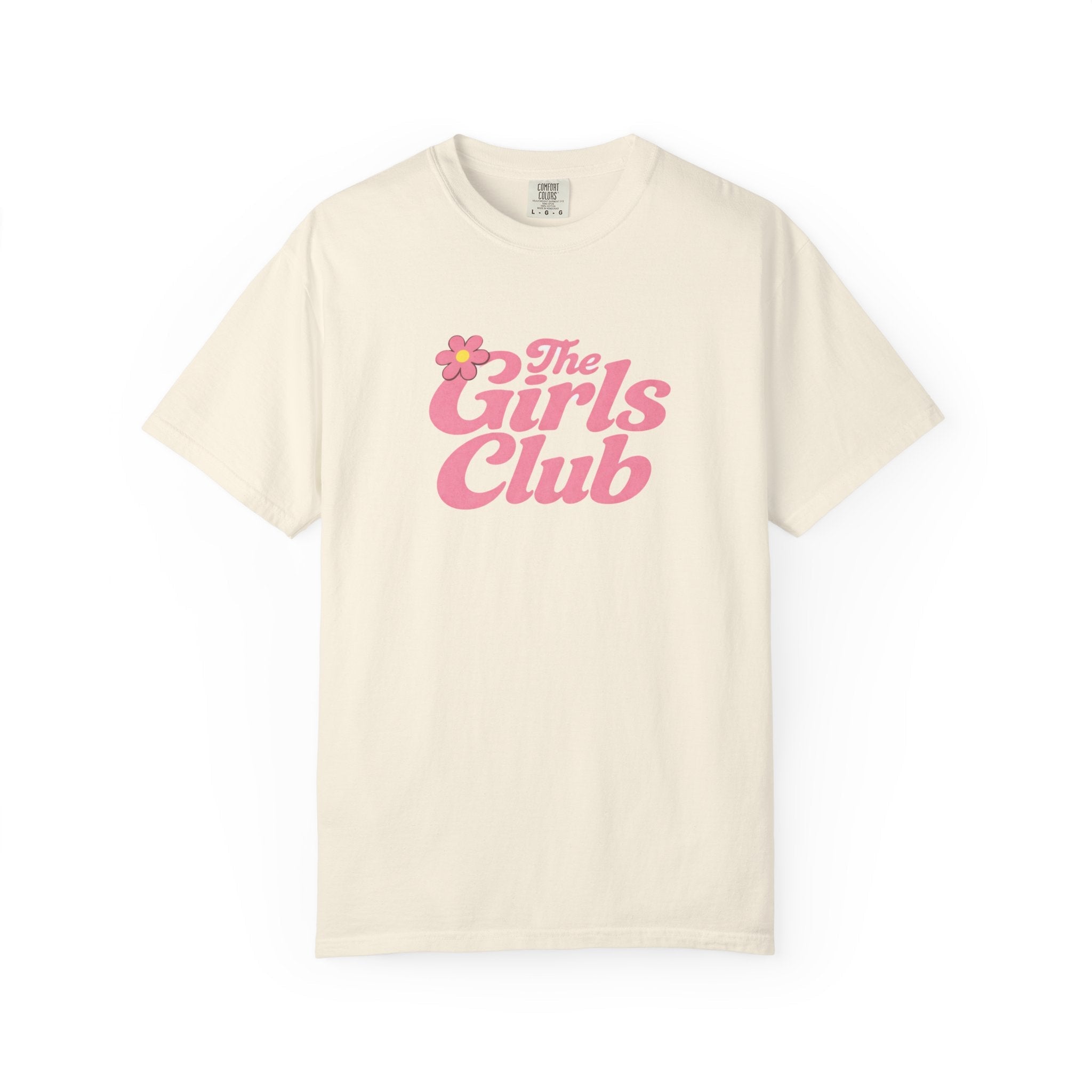 Beige t-shirt with 'The Girls Club' text in pink on a white background