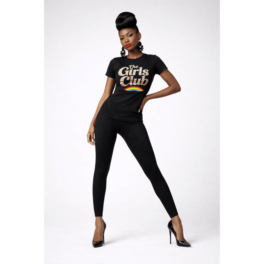 Woman model wearing a black t-shirt with 'The Girls Club' text and rainbow design on a white background