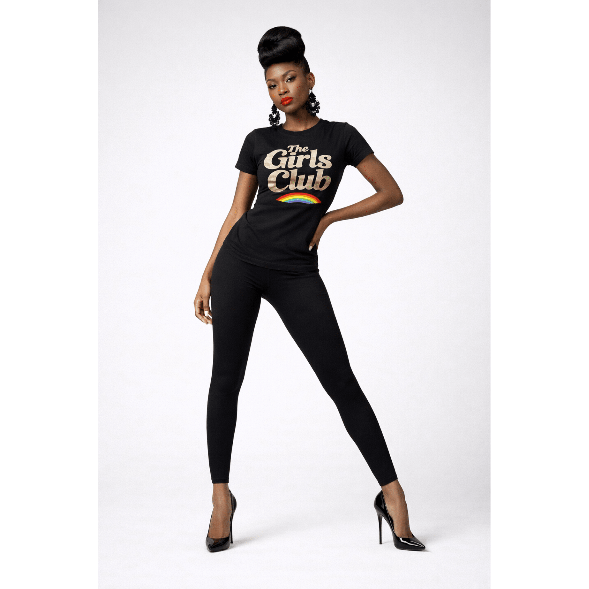 Woman model wearing a black t-shirt with 'The Girls Club' text and rainbow design on a white background