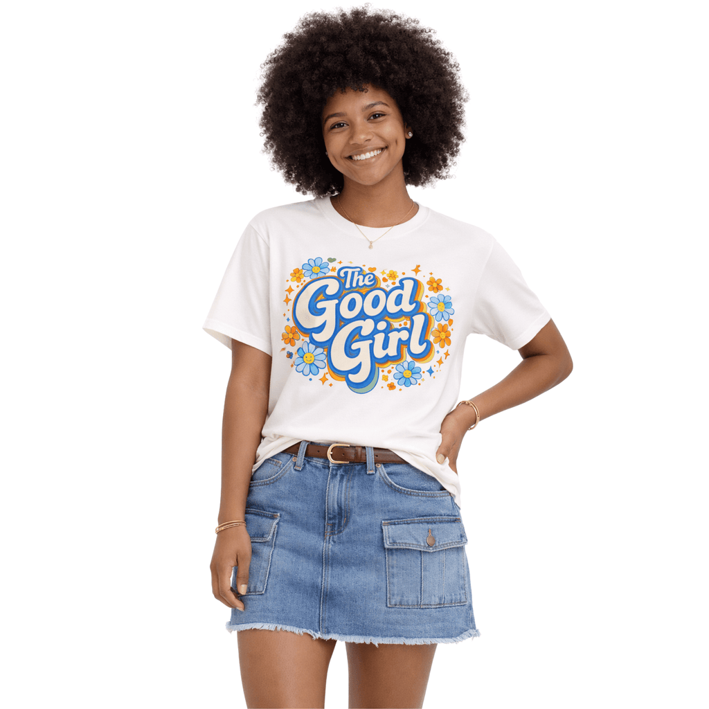 Model wearing a white t-shirt with 'The Good Girl' design and denim mini skirt on a white background