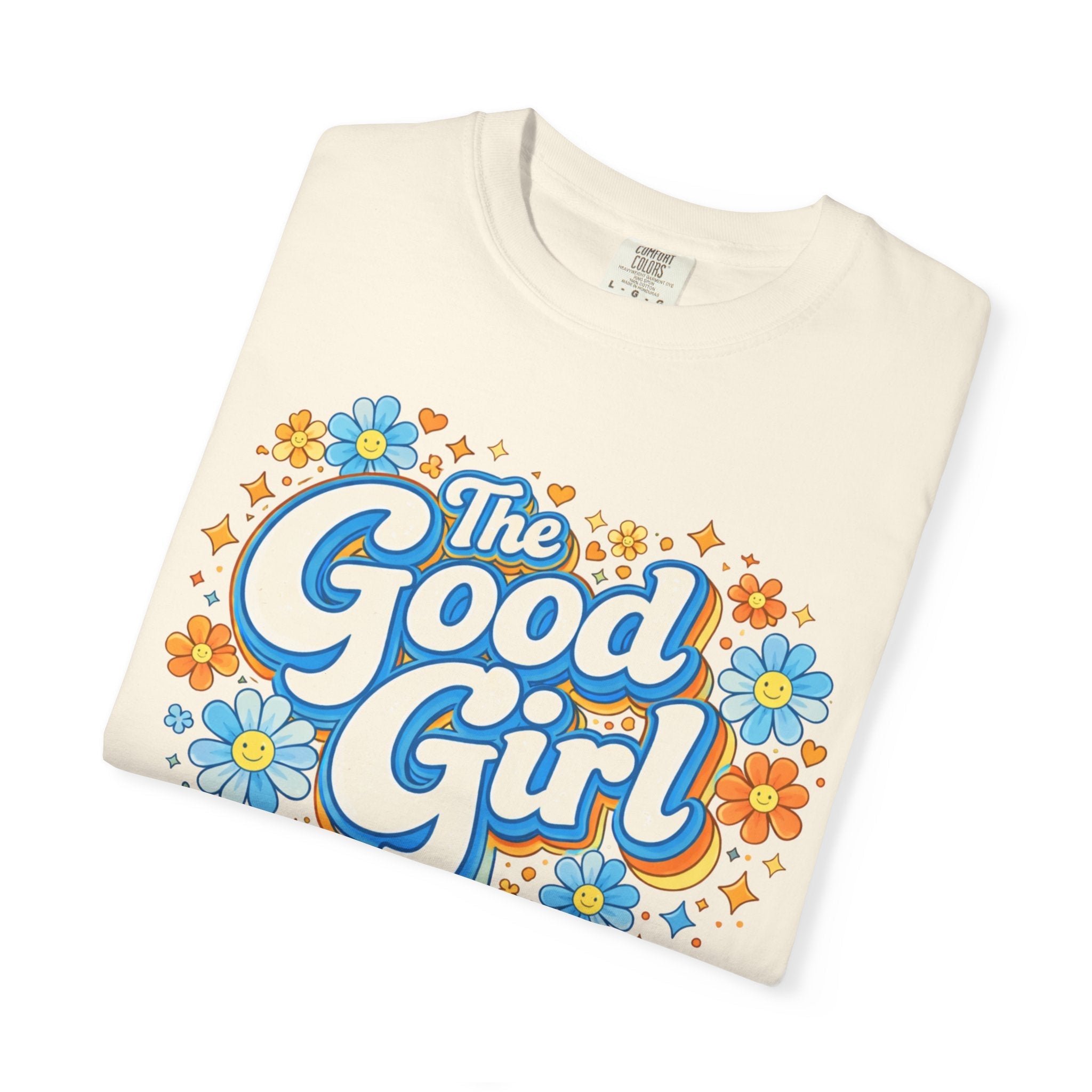Folded t-shirt with 'The Good Girl' graphic design on a white background