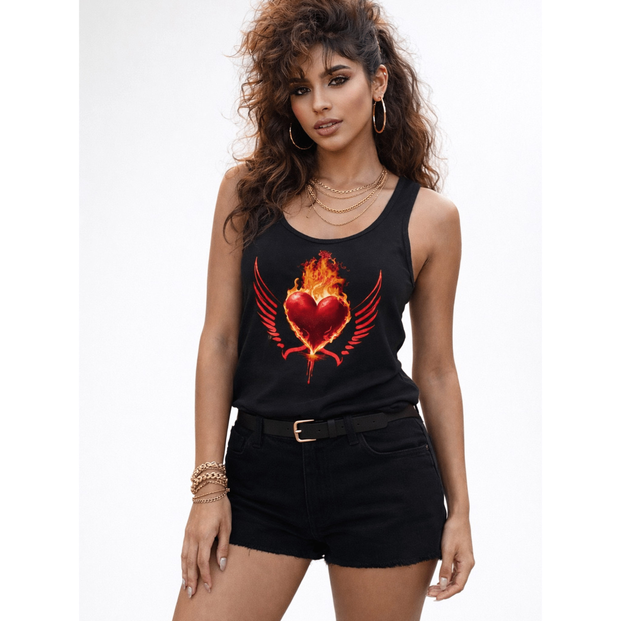 Woman wearing a black tank top with a heart design and black shorts on a white background