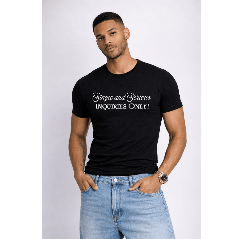 Man wearing a Relatable Designs black t-shirt with text 'Single and Serious Inquires Only', standing against a white background