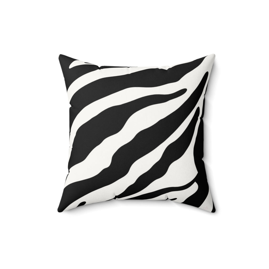 Black and white faux suede tiger pattern decorative pillow on a white background