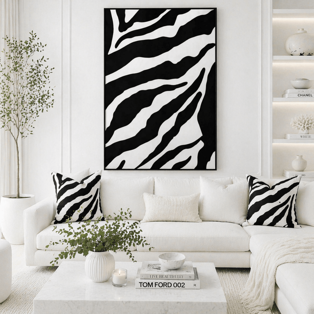 High contrast abstract wall art in black and white styled in a modern neutral interior