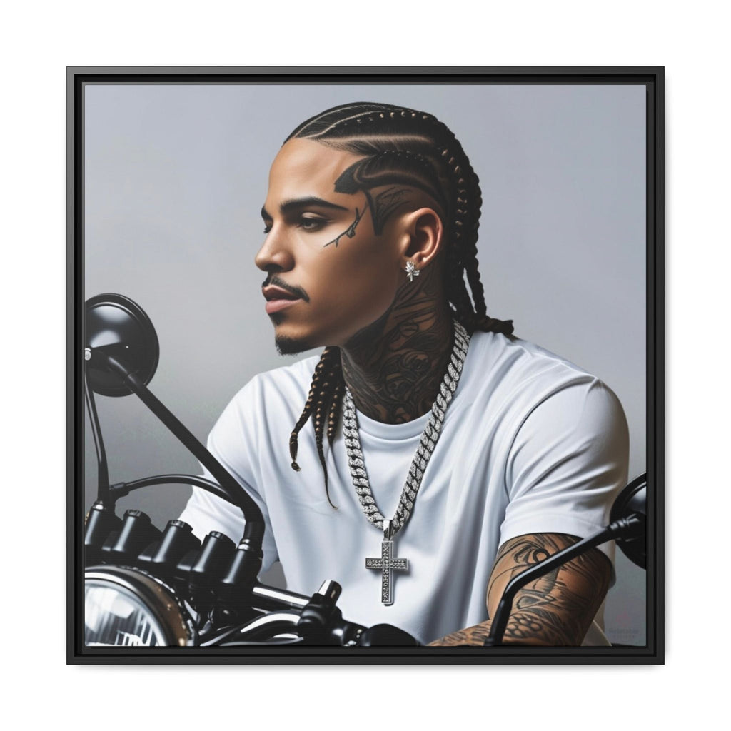 Man with braided hair and tattoos sitting on a motorcycle, wearing a white shirt and chains by Relatable Designs.