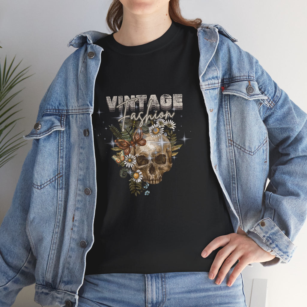 Person wearing a black t-shirt with a skull design and 'Vintage Fashion' text, paired with a denim jacket by Relatable Designs.