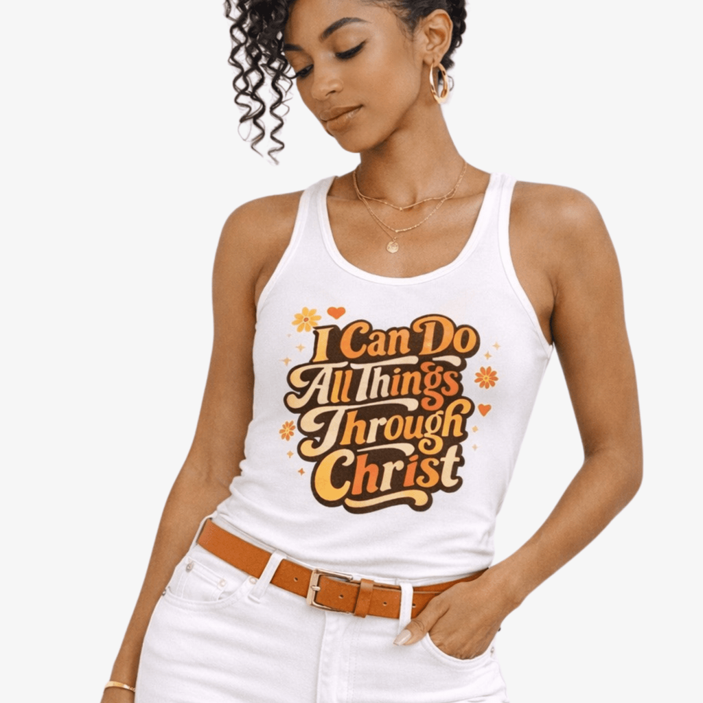 Woman wearing a white tank top with motivational text 'I Can Do All Things Through Christ' on a plain background