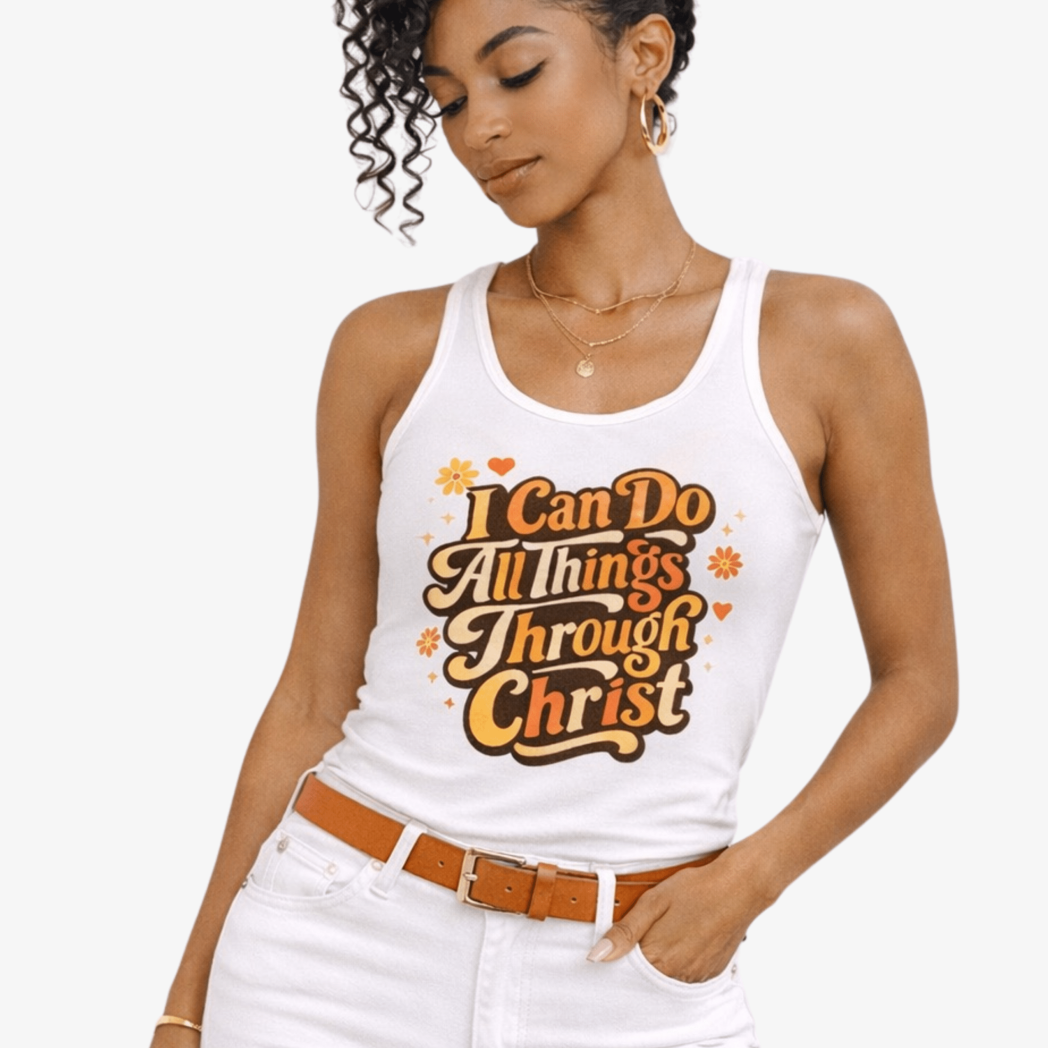 Woman wearing a white tank top with motivational text 'I Can Do All Things Through Christ' on a plain background